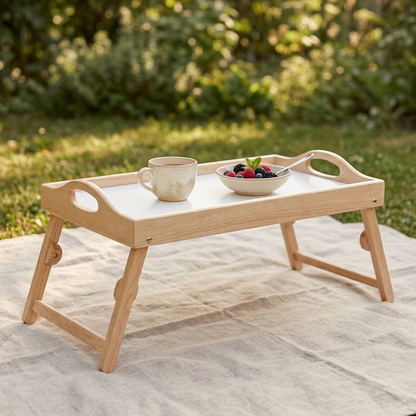 Folding breakfast tray styled for a quiet garden picnic